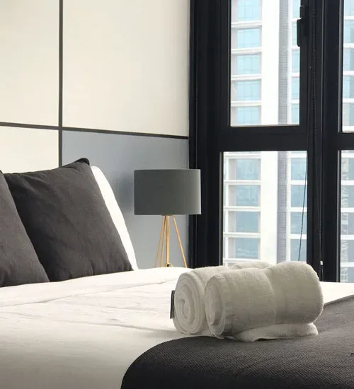 Hotel bed with fresh linens