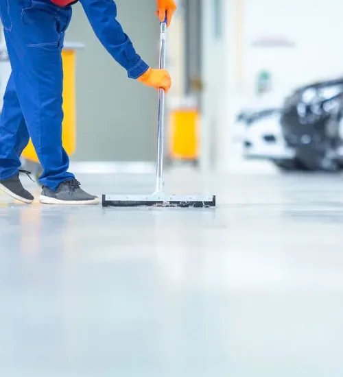 Squeegeeing a polished floor